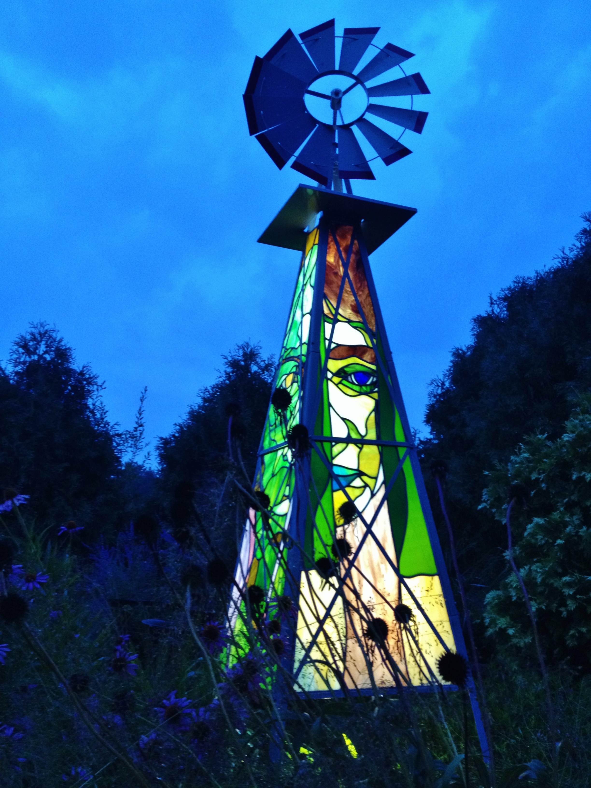 Windmill Obelisk with Portraits of People Posing with Fruits and Vegetables