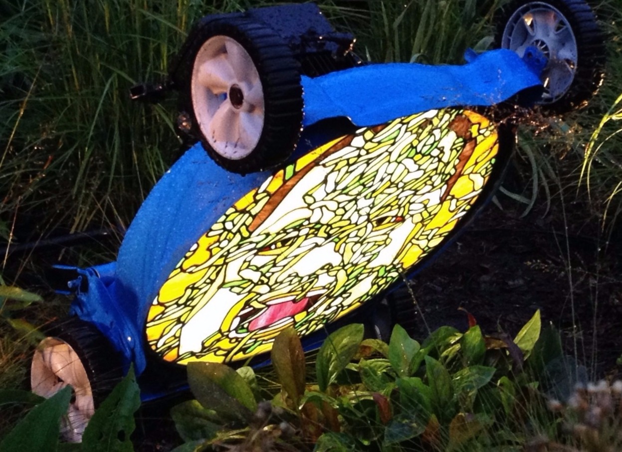 Lawnmower with Portrait of Man with Shredded Lettuce